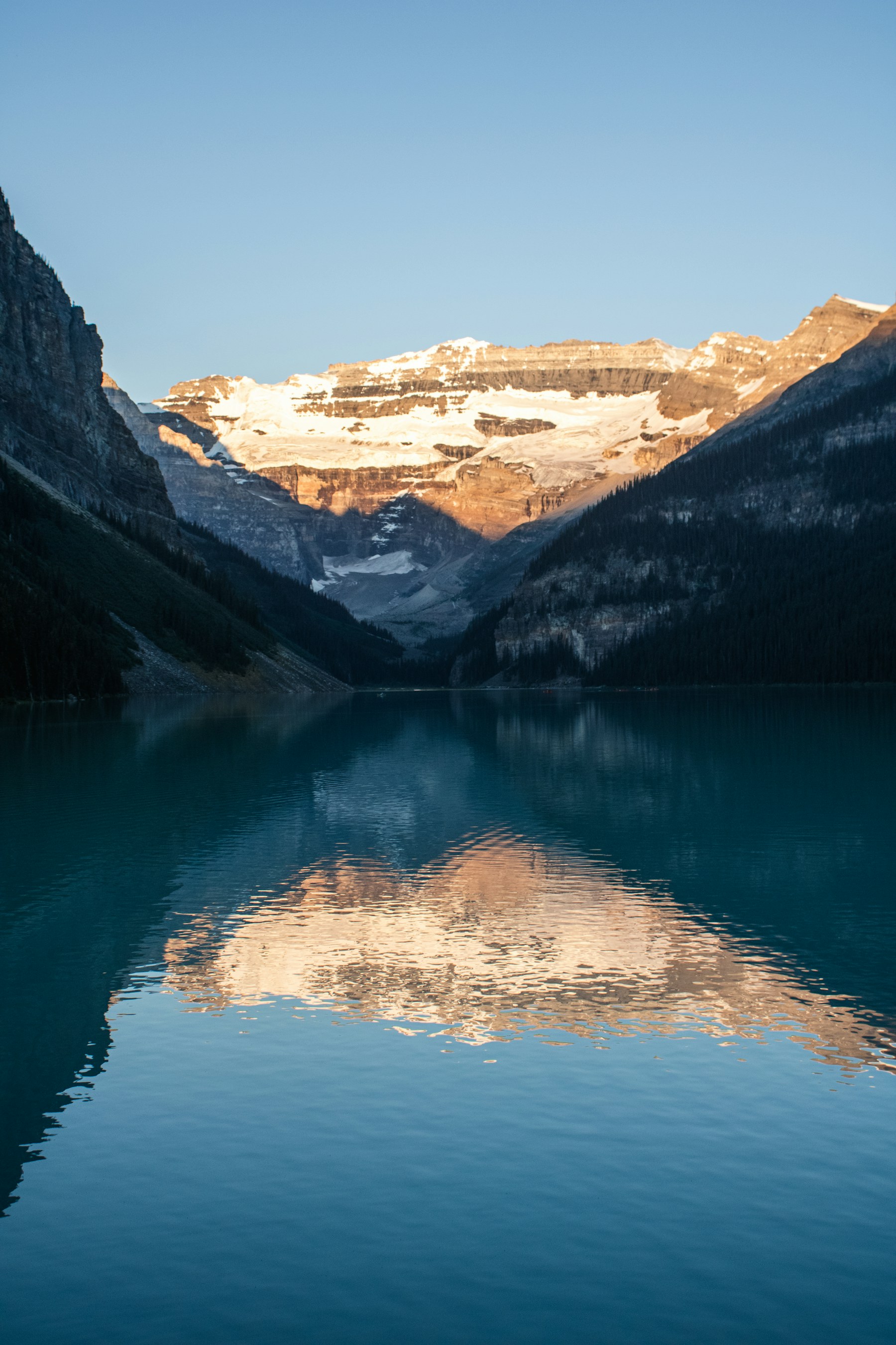 Sunrise light on the mountains above Lake Louise, Alberta, Canada